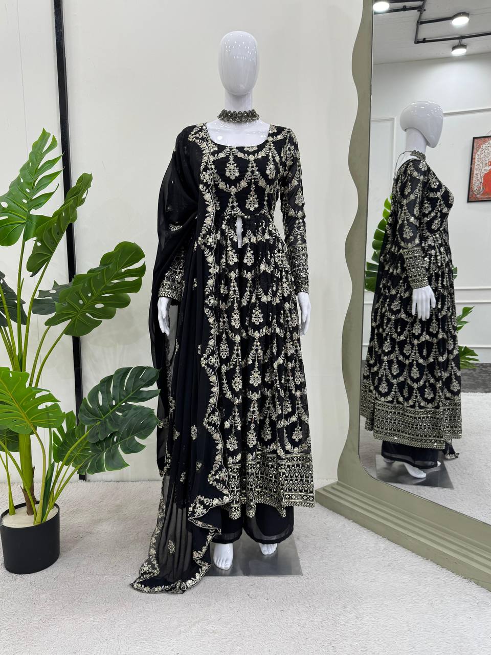 Three-piece ensemble featuring a faux georgette top pent with dupatta