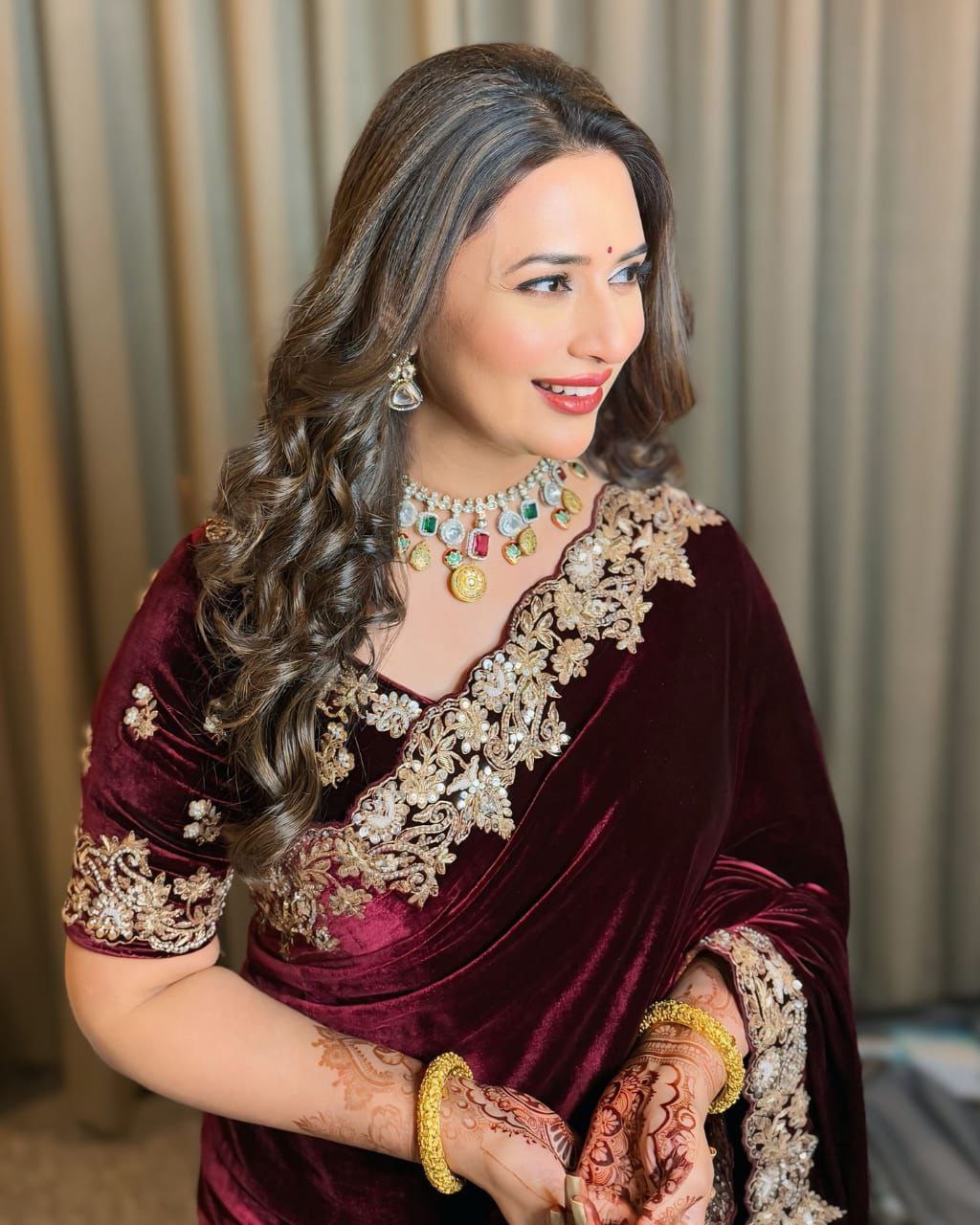 Velvet Saree showcasing opulent designer sequence and Jari thread embroidery