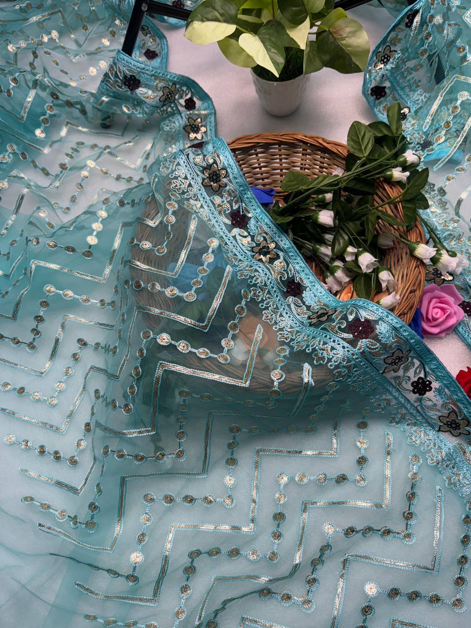 Butterfly Net saree, meticulously crafted with designer chain stitch embroidery